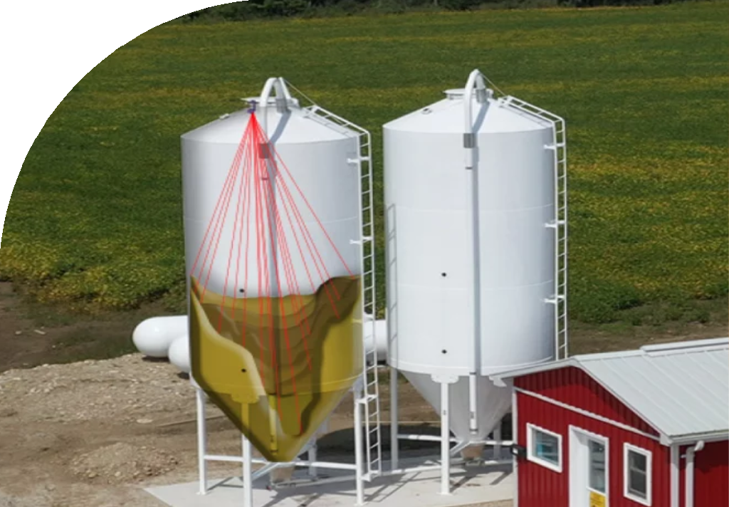Two white silos with a 3D render visualizing levels of feeding bins. Two white silos with a 3D render visualizing levels of feeding bins.